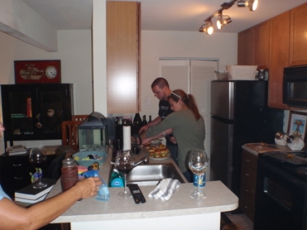 Em & Adam making dinner for us
in their new digs.