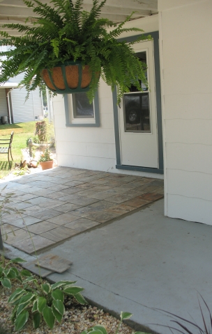 Dan & Robin start laying tile (more to come when complete)...Looks Great!