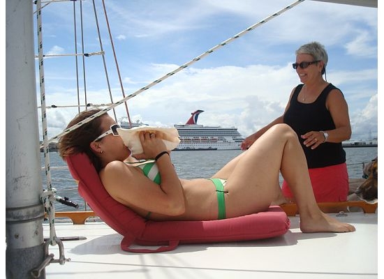 Em and Pat blowing the Conch Horn