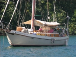 Homeward Bound anchored in Jonesville, Roatan, Honduras
